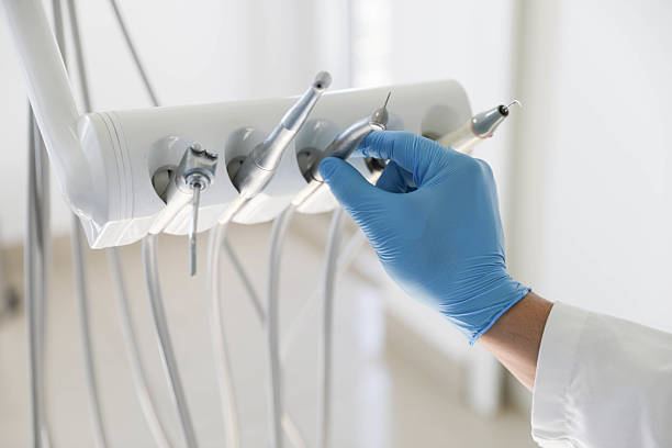 Professional Dental Implants technician working in Arkansas City, KS